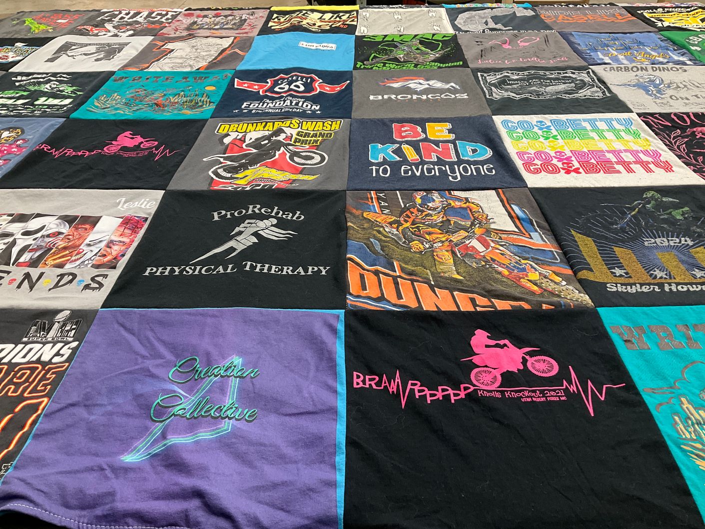 T-shirt quilt with physical therapy, motor sports themes by Leslie from UT