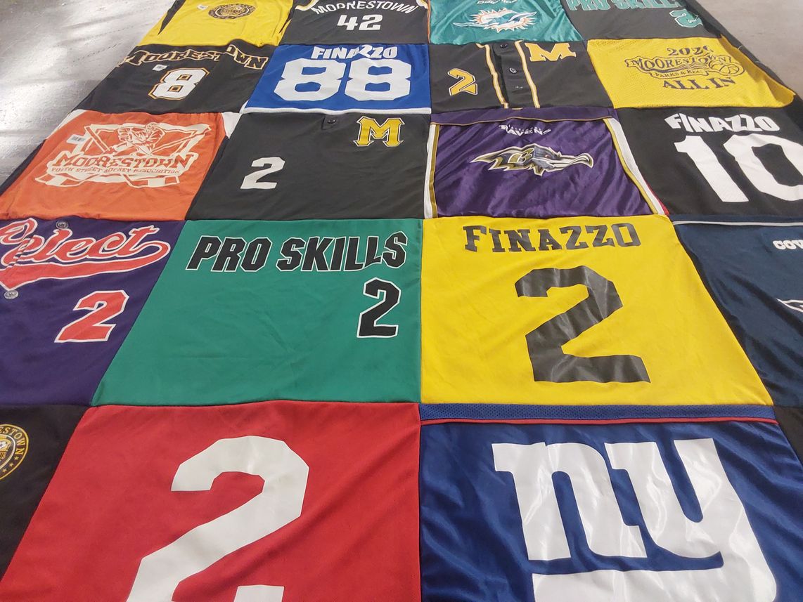 T-shirt quilt featuring baltimore ravens, new york giants by Erin from NJ