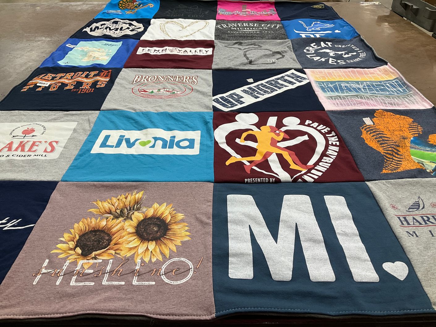 T-shirt quilt with sports, nature themes by Kathryn from MI
