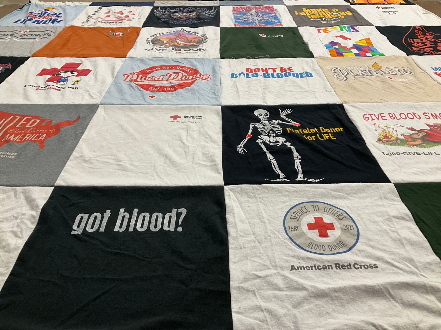 T-shirt quilt with blood donation, healthcare themes by Carrie from VA