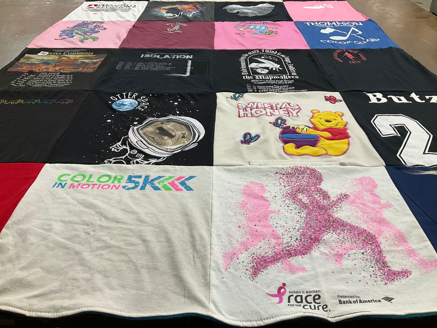 T-shirt quilt with running, space themes by Sarah from CA