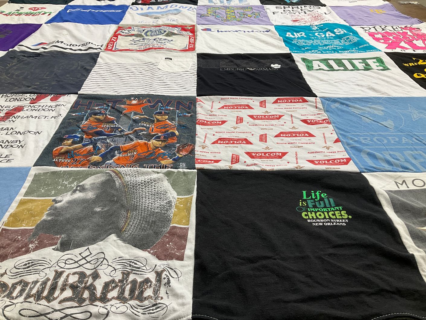 T-shirt quilt with sports, music themes by Amanda from TX