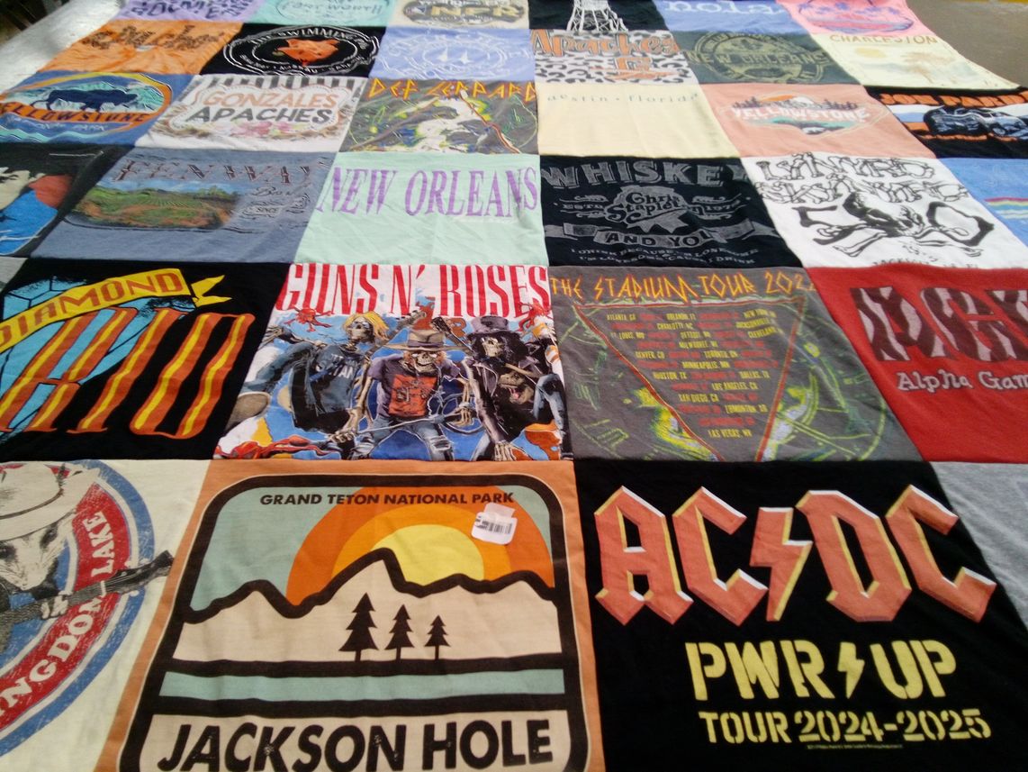 T-shirt quilt with music, travel themes by Malinda from TX