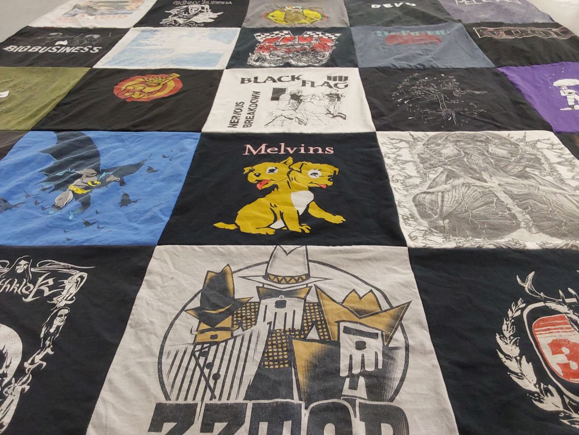 T-shirt quilt with music, comics themes by Kurt from WI