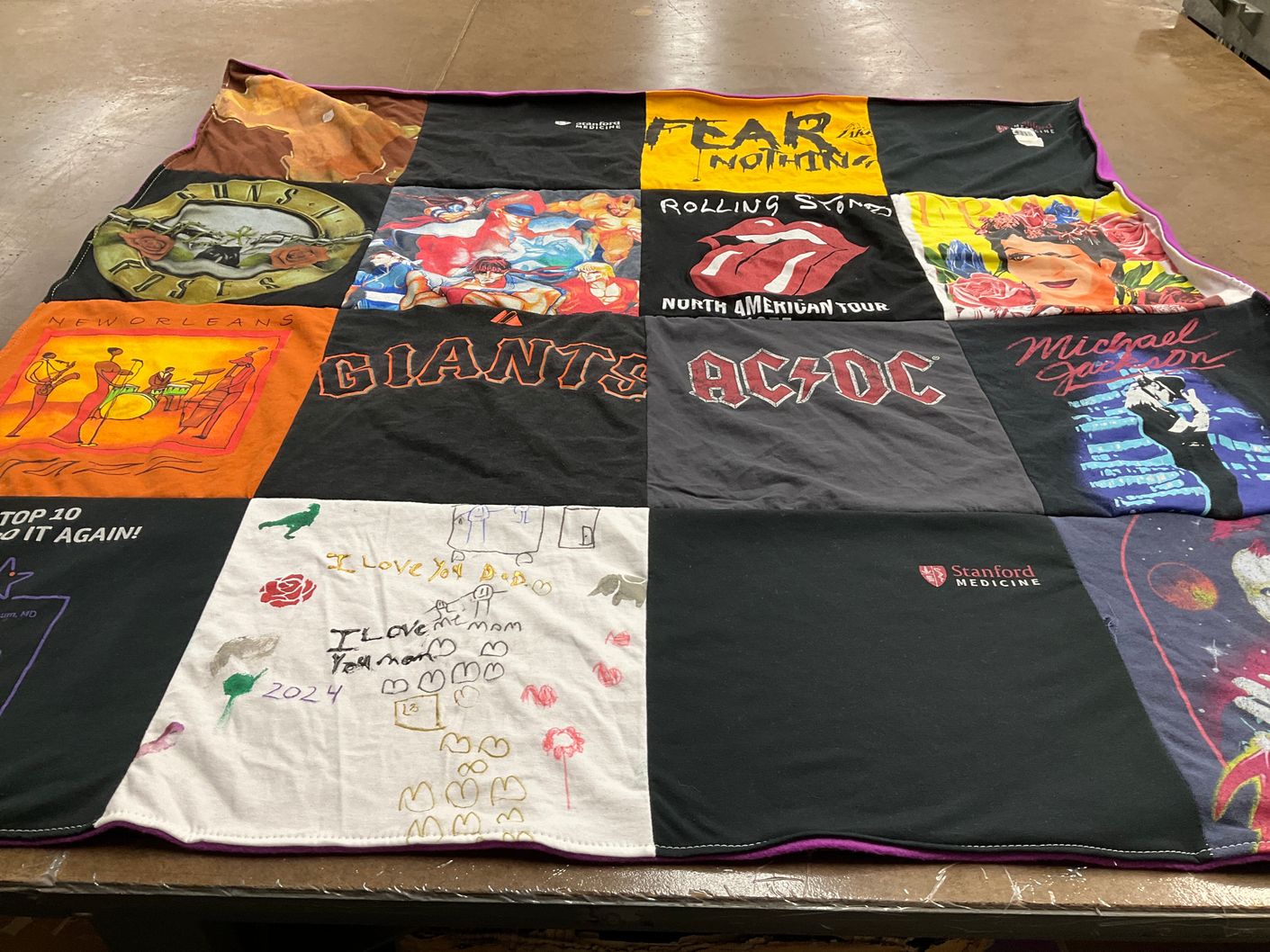 T-shirt quilt with music, sports themes by Jeffrey from CA