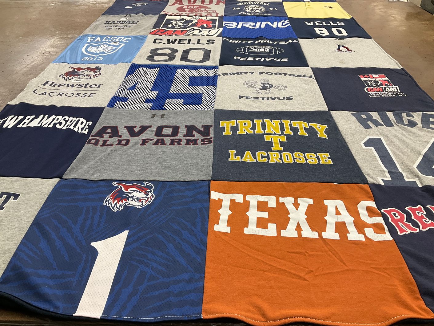 T-shirt quilt featuring lacrosse team, football team by Kaitlin from NH