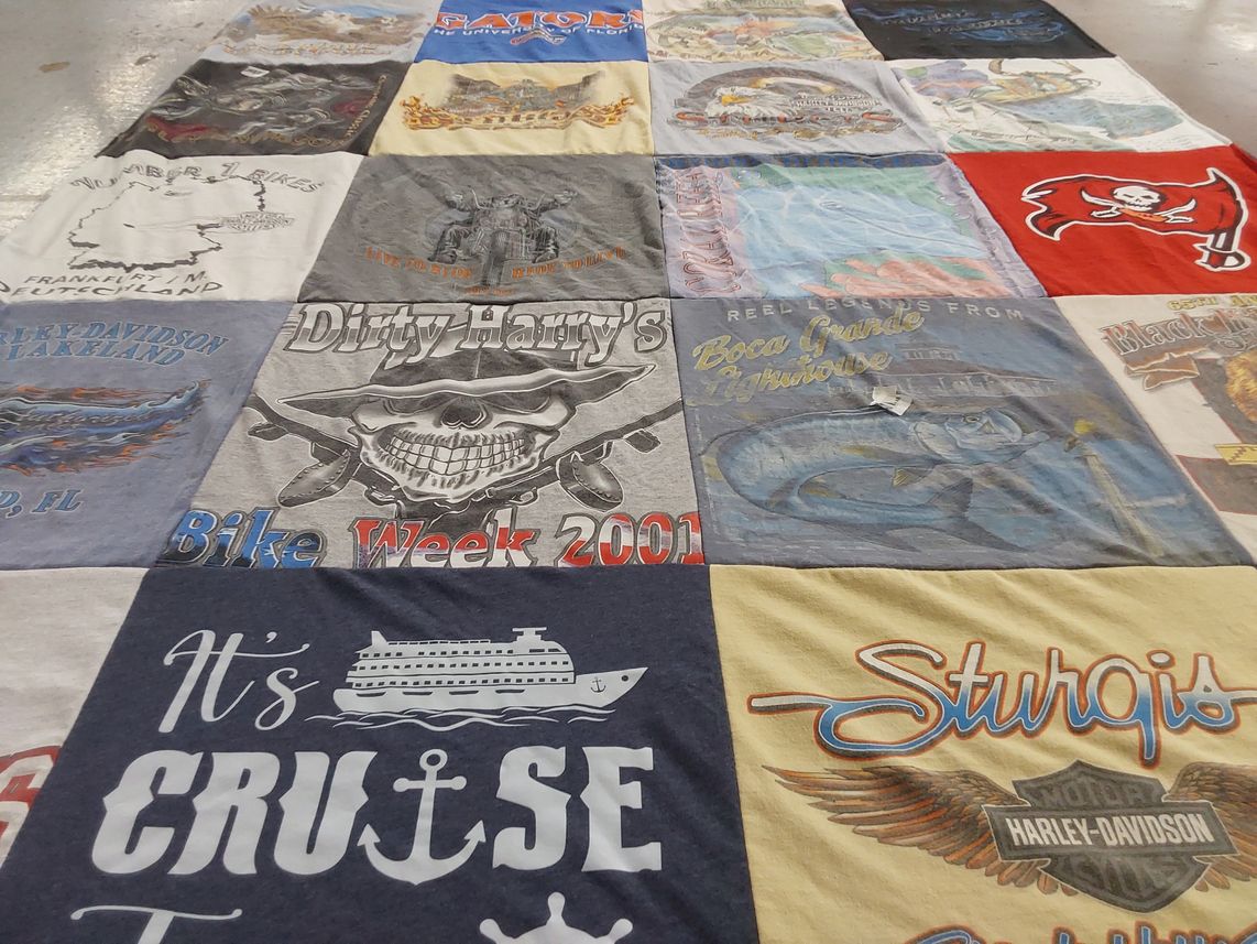 T-shirt quilt with motorcycles, boating themes by Mary from FL
