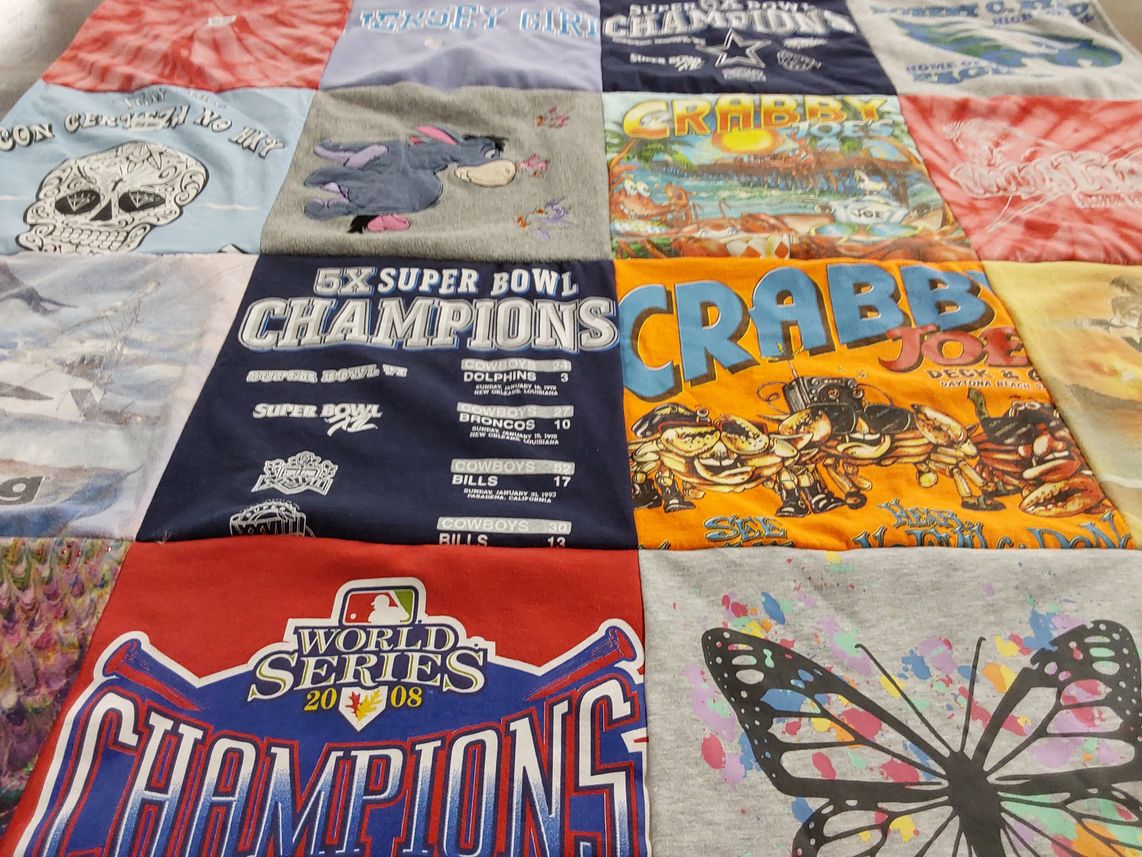 T-shirt quilt featuring miami dolphins, denver broncos by Cassidy from WV