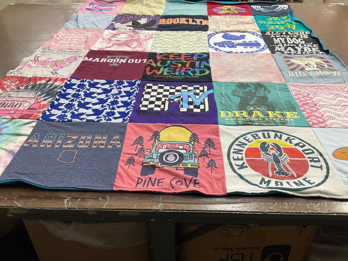 T-shirt quilt with music, travel themes by Crystal from TX