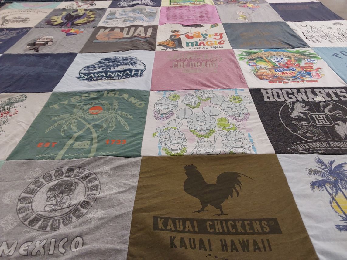 T-shirt quilt with travel, beaches themes by Jane from MO