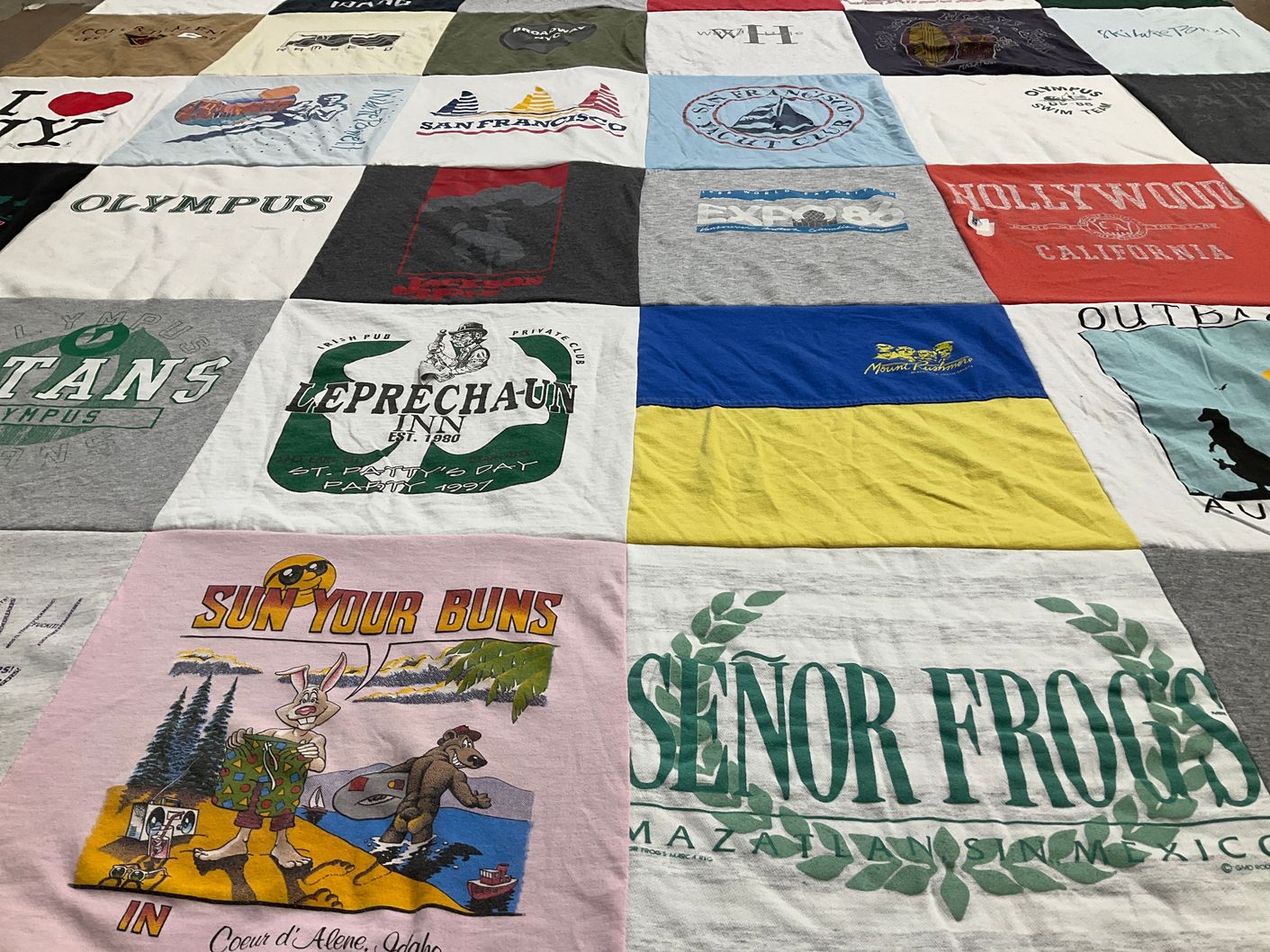 T-shirt quilt from olympus university by Sharon from UT