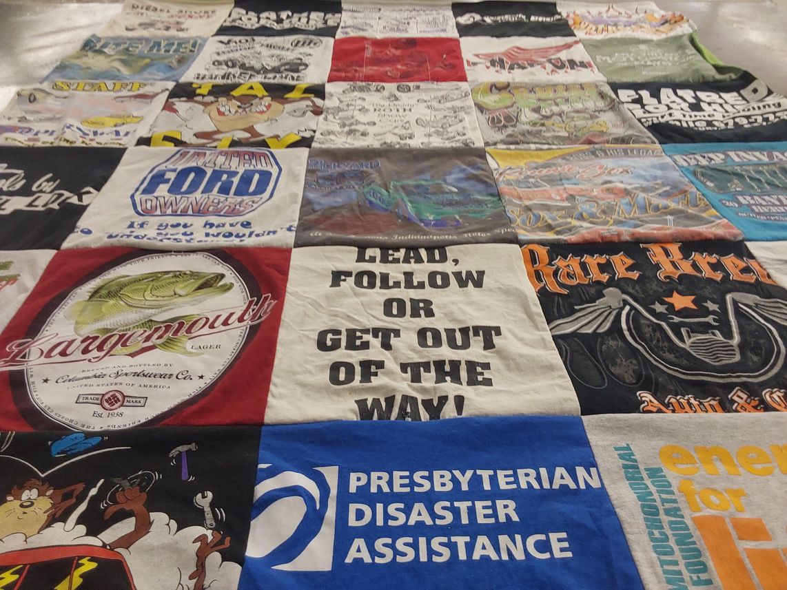 T-shirt quilt with fishing, automobiles themes by Holly from PA