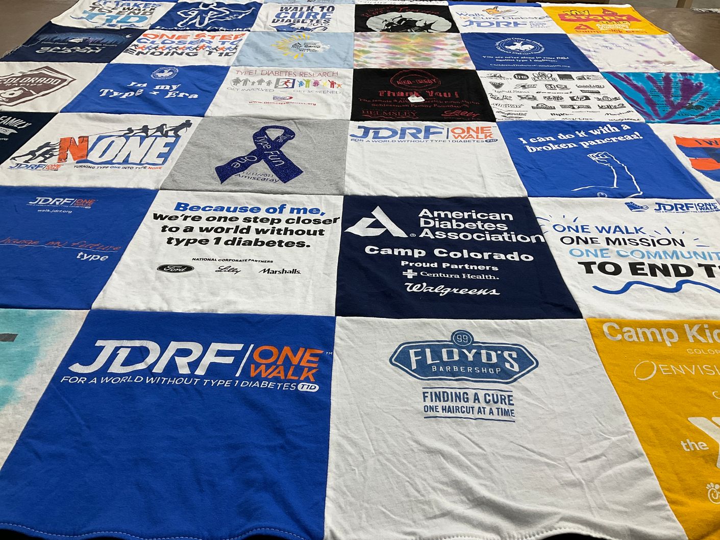 T-shirt quilt with health, diabetes research themes by Tami from CO