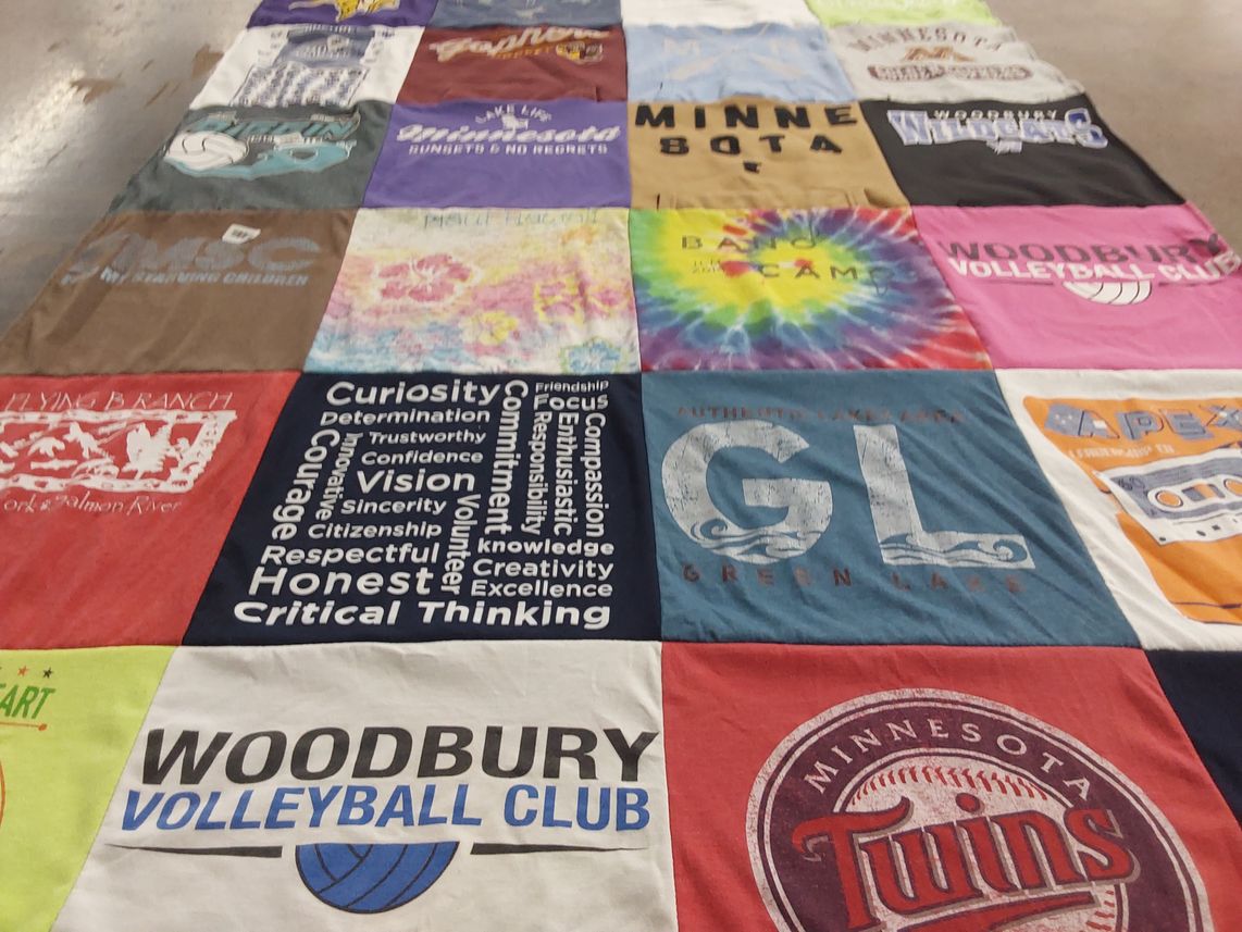 T-shirt quilt with volleyball, camping themes by Barbara from MN