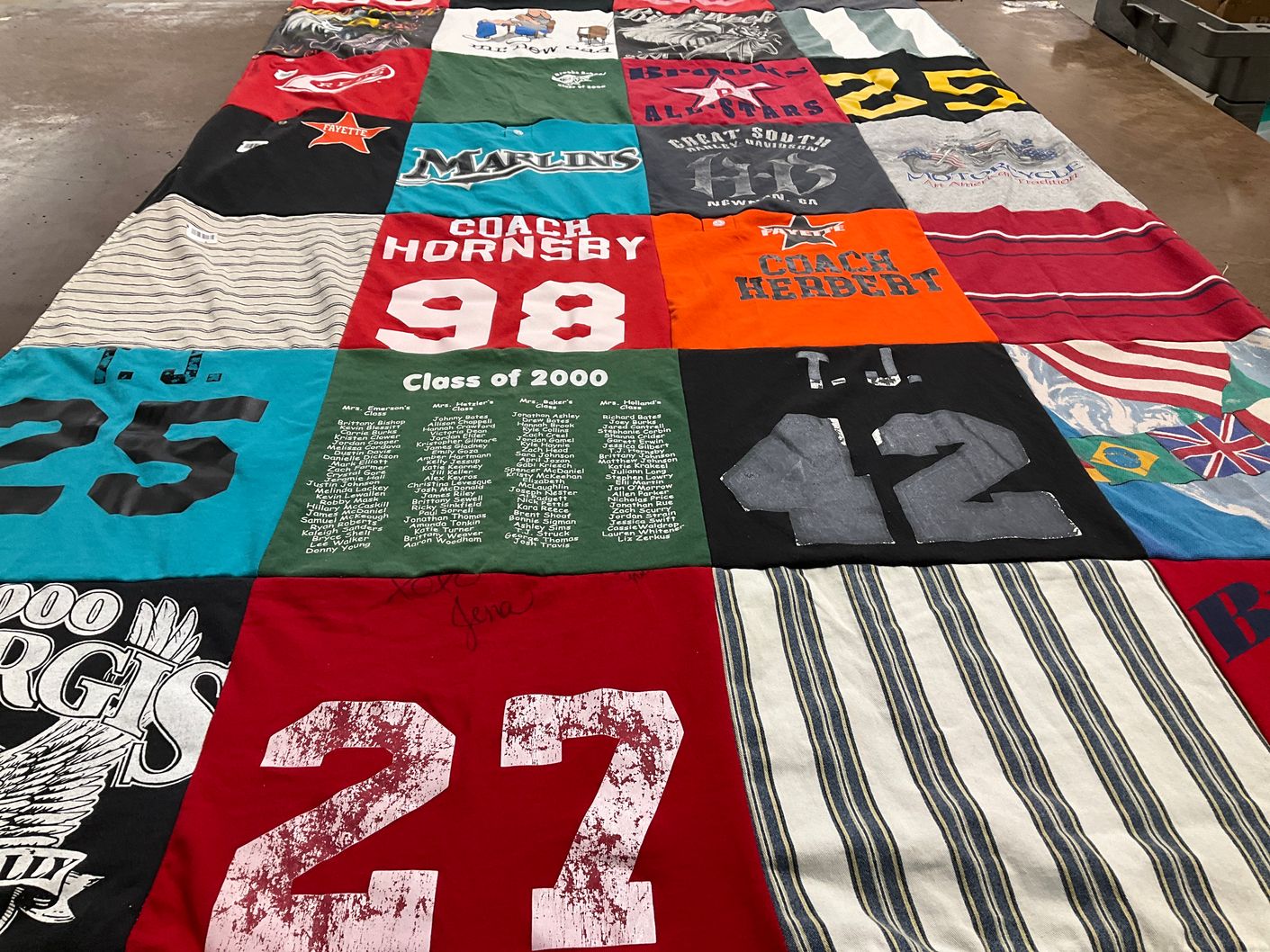 T-shirt quilt with sports, coaching themes by Sandra from GA