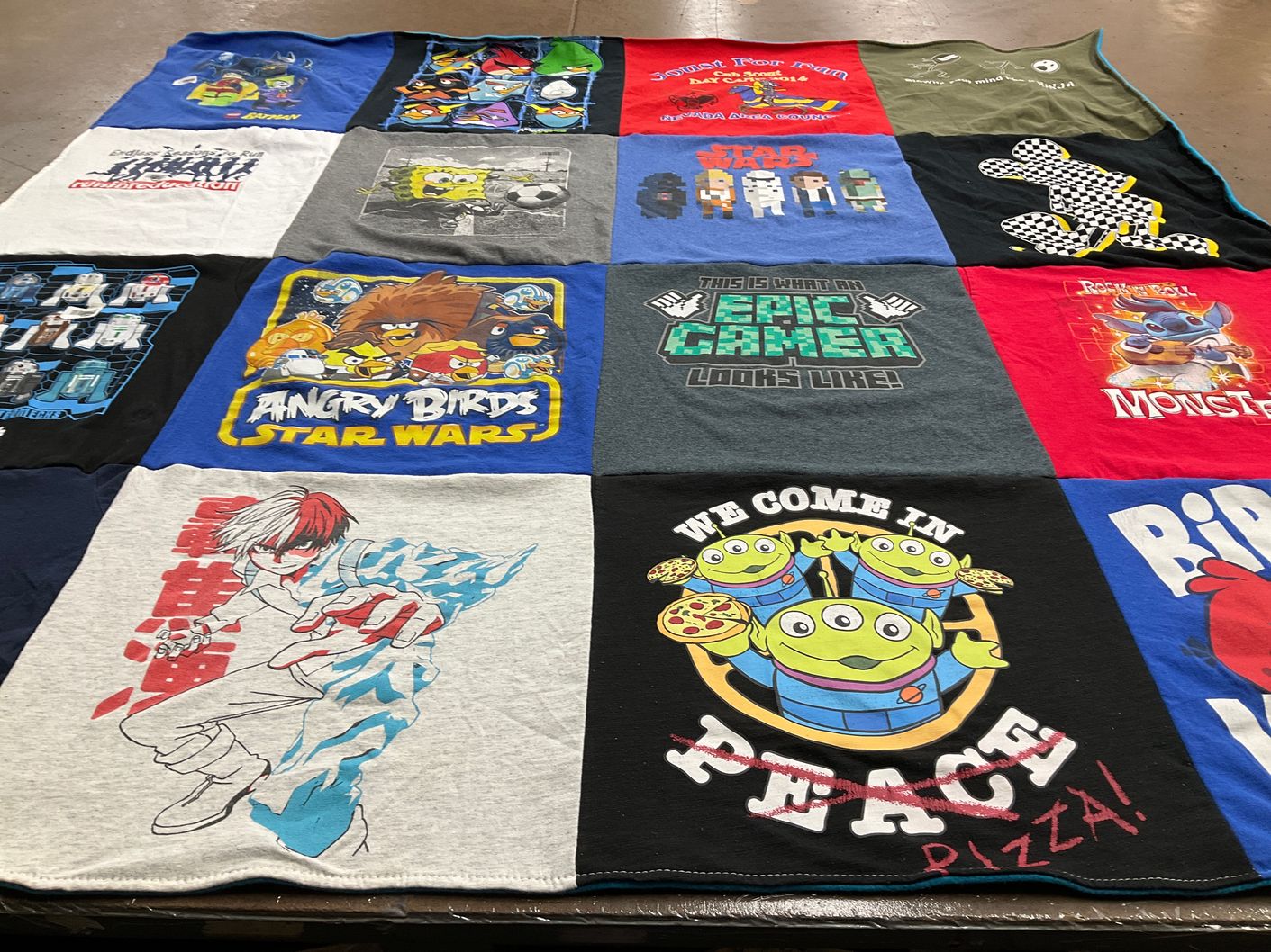 T-shirt quilt with gaming, animation themes by Joy from NV