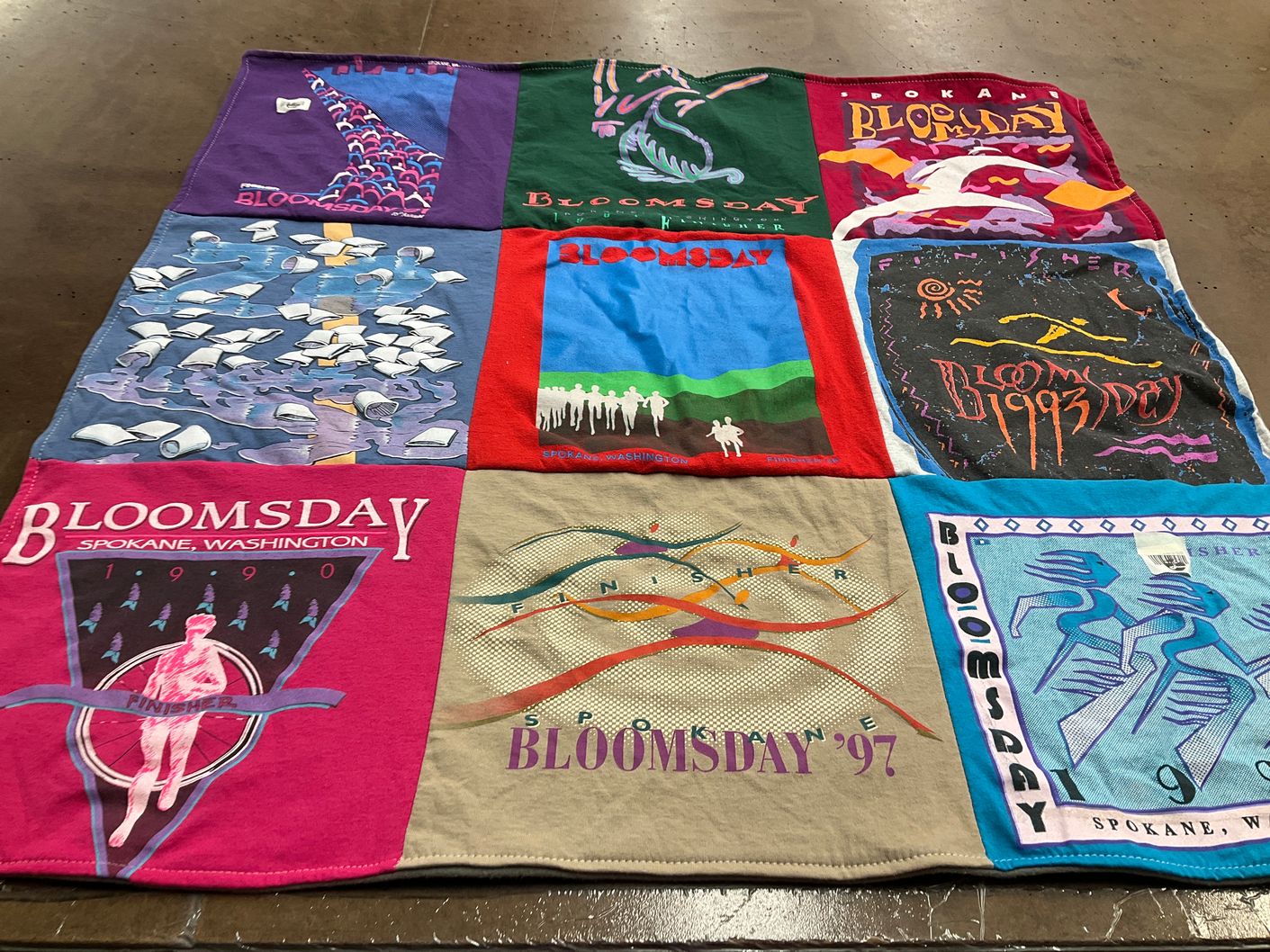 T-shirt quilt with running, events themes by Charity from WA