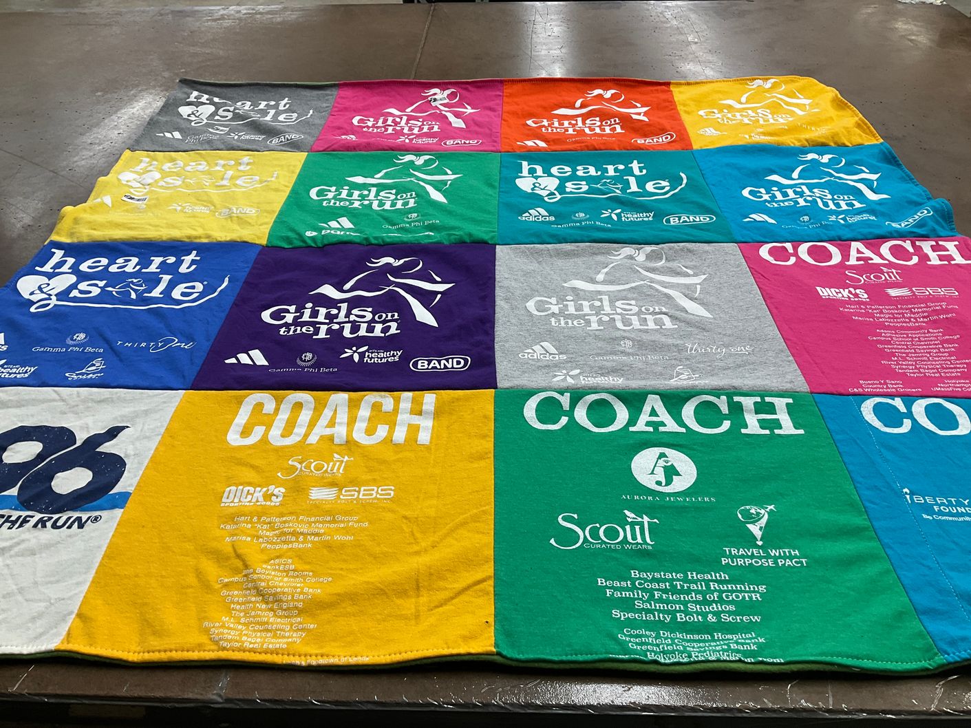 T-shirt quilt with running, charity themes by Naomi from IN