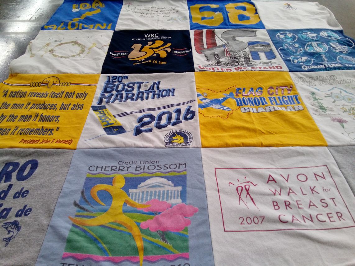 T-shirt quilt with running, charity themes by Rebecca from OH