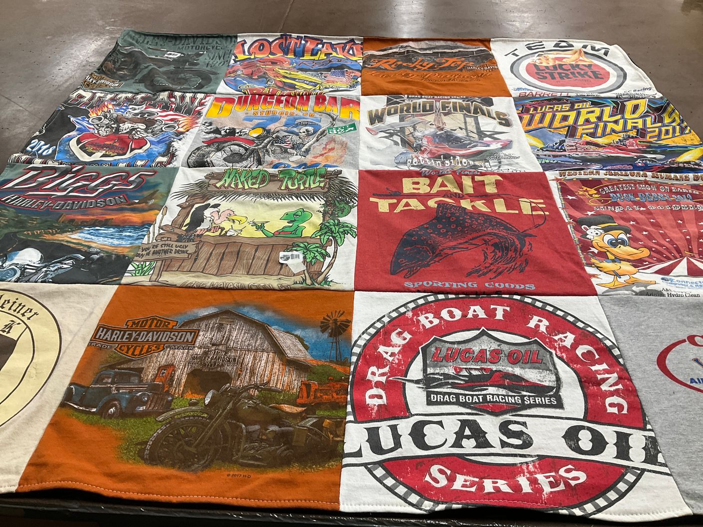 T-shirt quilt with motorcycles, boating themes by Katie from CA