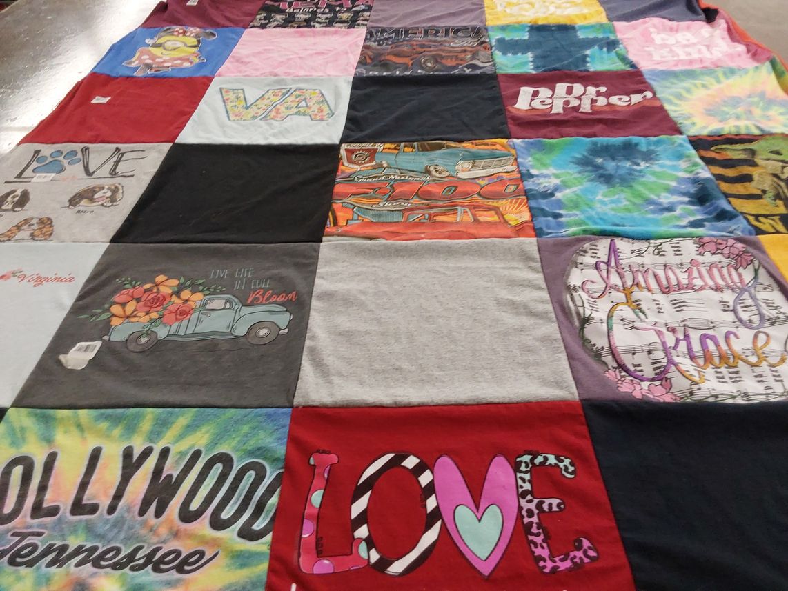 T-shirt quilt with art, music themes by Malene from VA