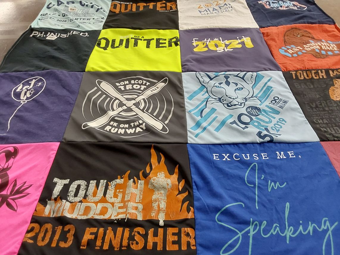 T-shirt quilt with running, marathons themes by Monique from OH