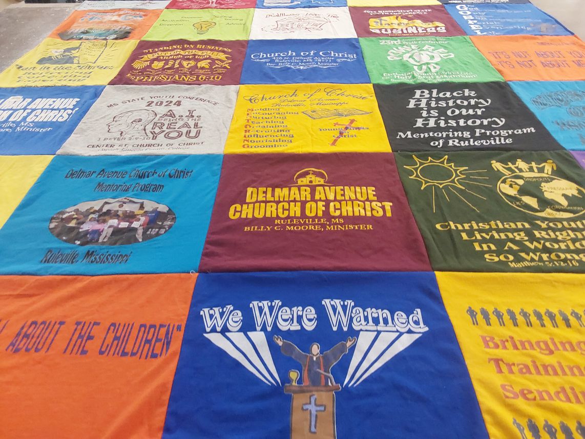 T-shirt quilt with community service, youth mentorship themes by Andrea from TN