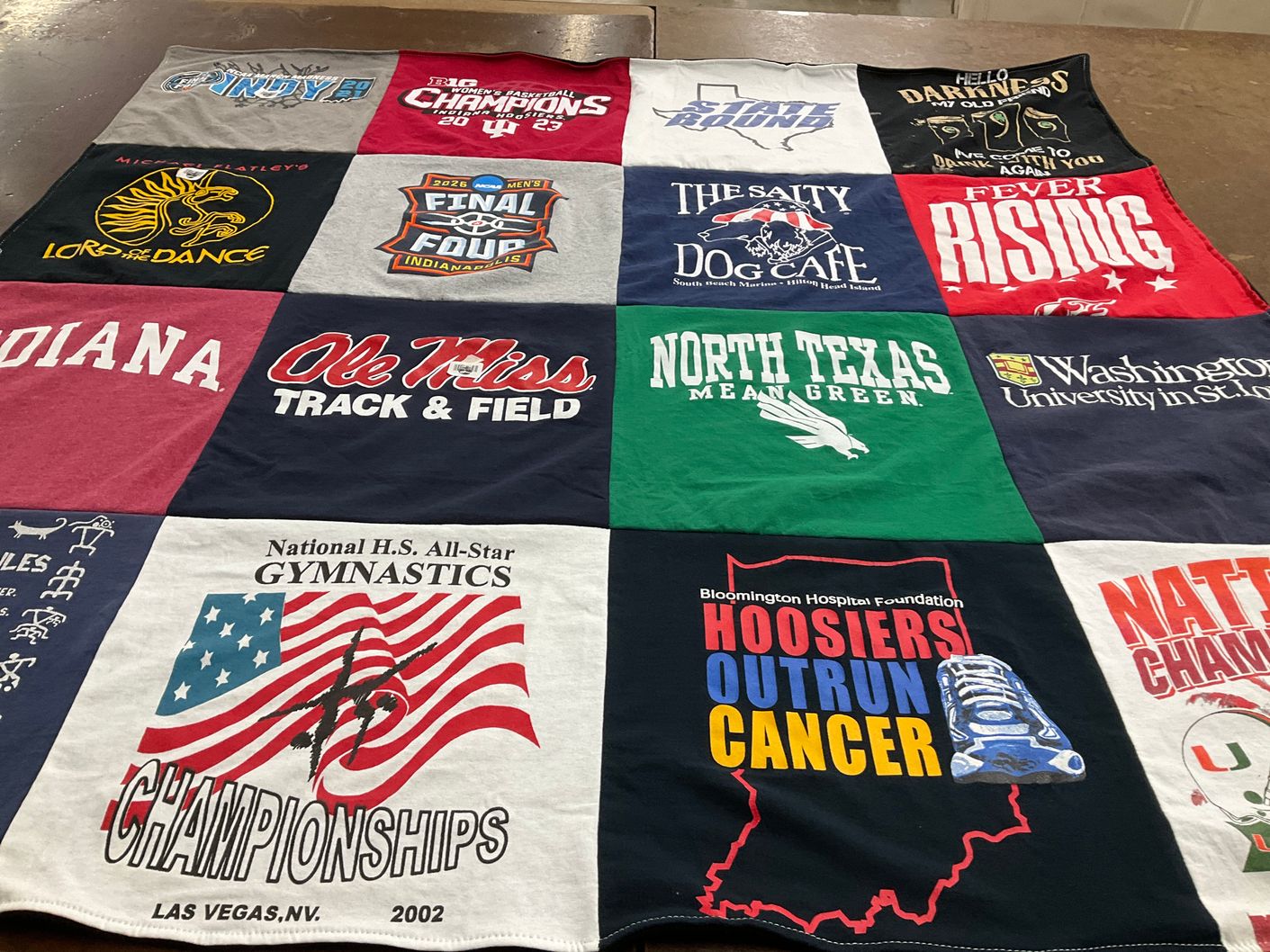 T-shirt quilt featuring ole miss track and field, north texas mean green by William from IN