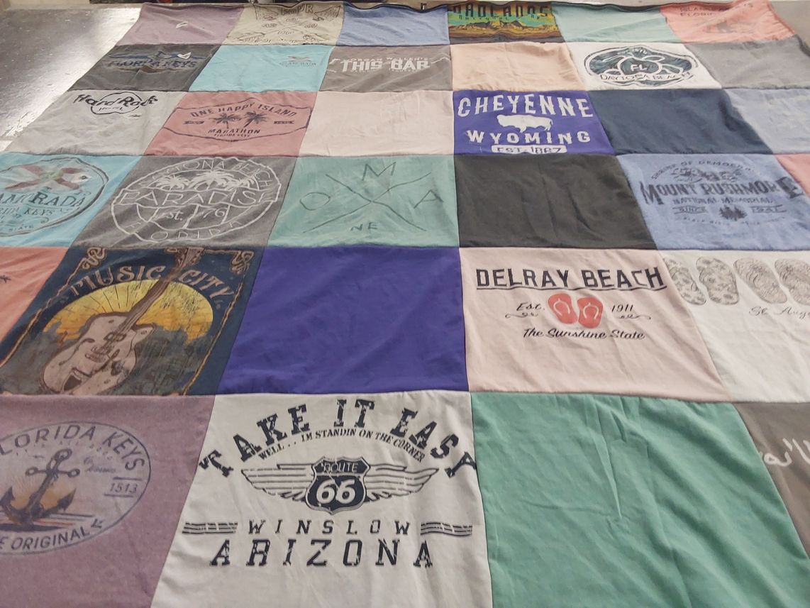 T-shirt quilt with travel, beaches themes by Melinda from NC