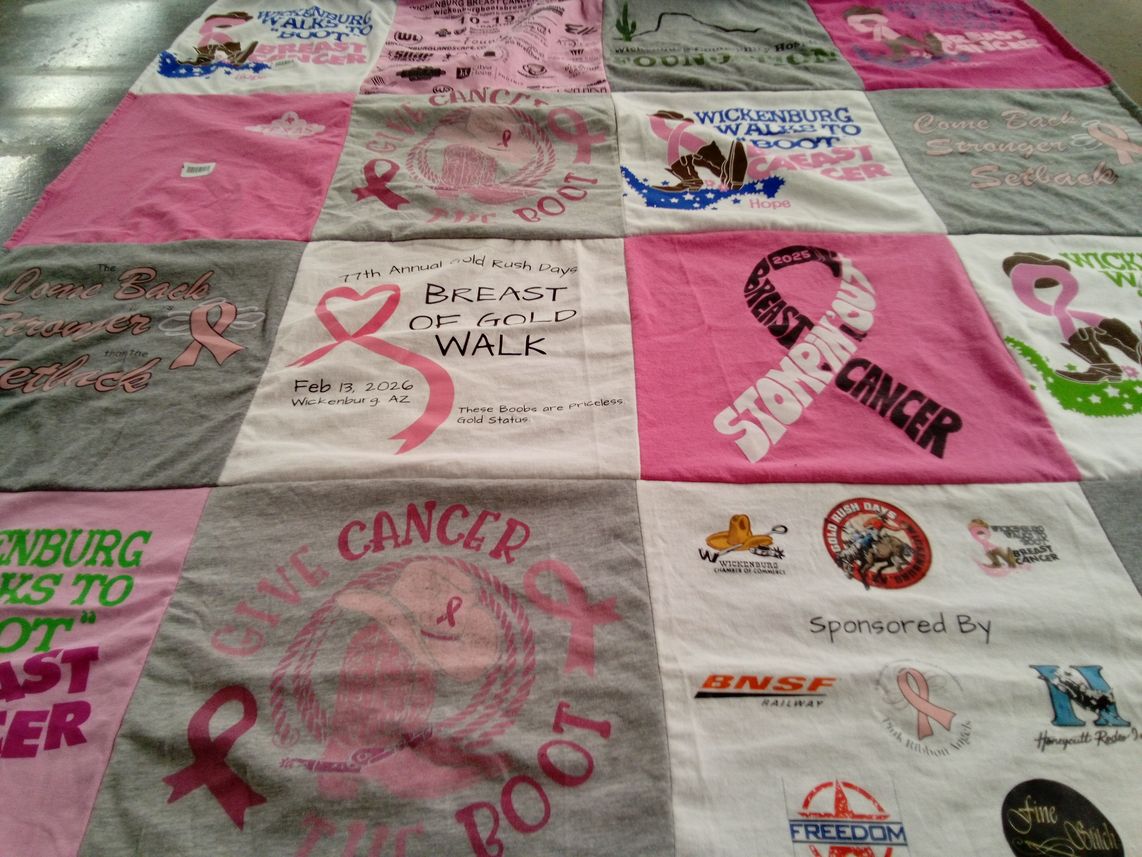 T-shirt quilt with breast cancer awareness, community support themes by Ruth from AZ