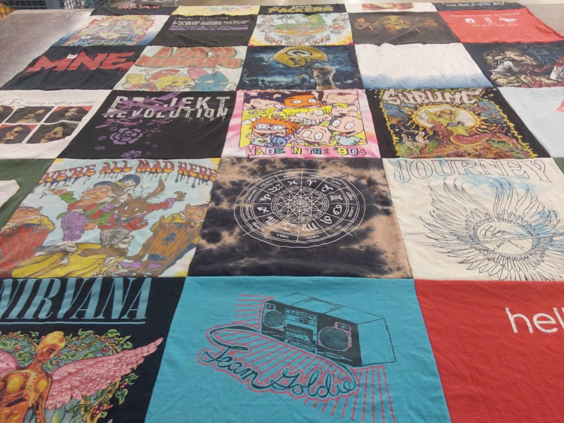T-shirt quilt with music, art themes by Barbara from NJ