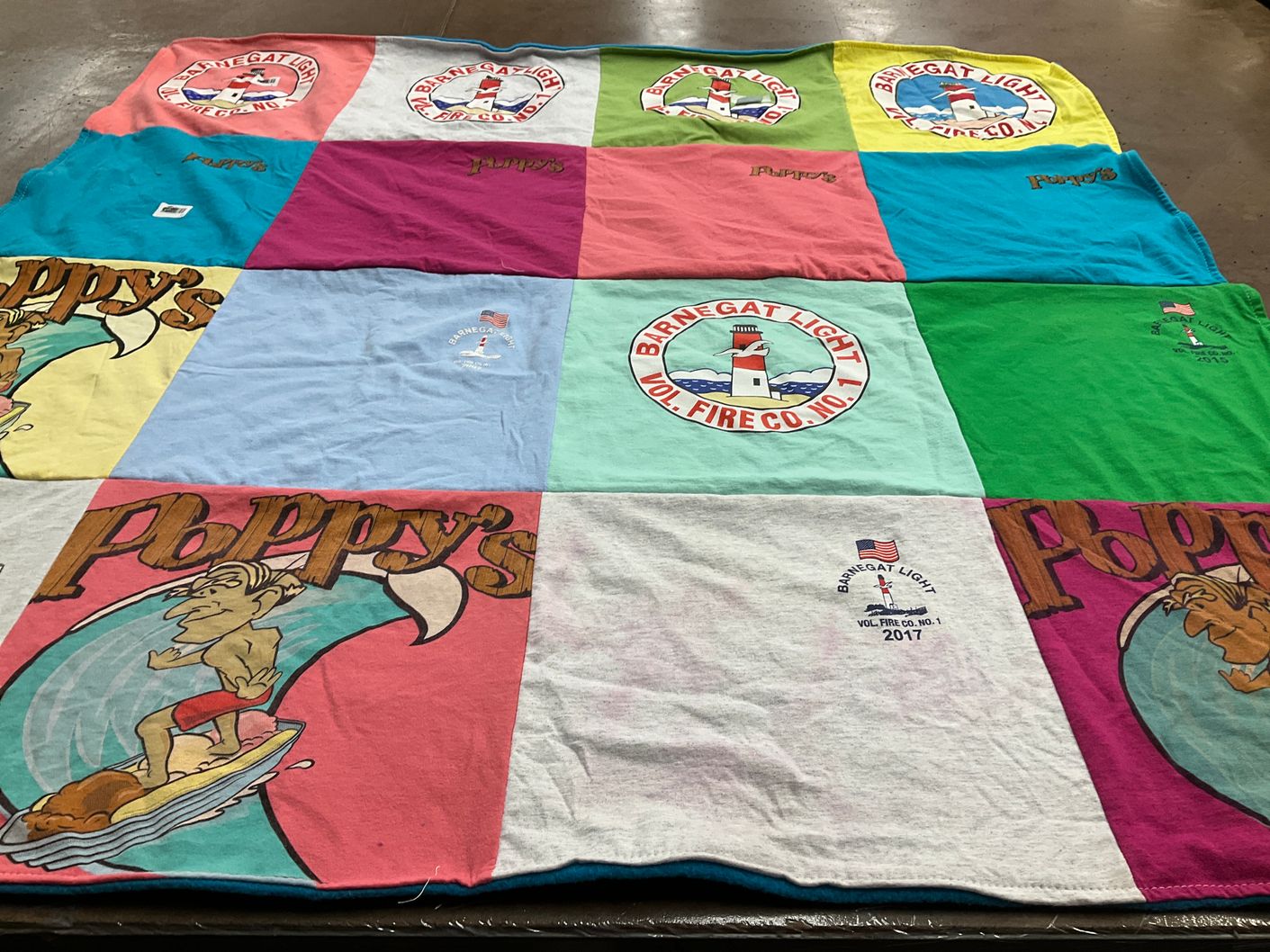 T-shirt quilt with surfing, firefighting themes by Elaine from PA