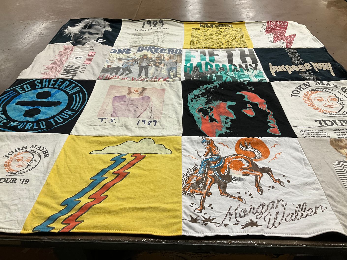 T-shirt quilt with music, concerts themes by Grace from MI