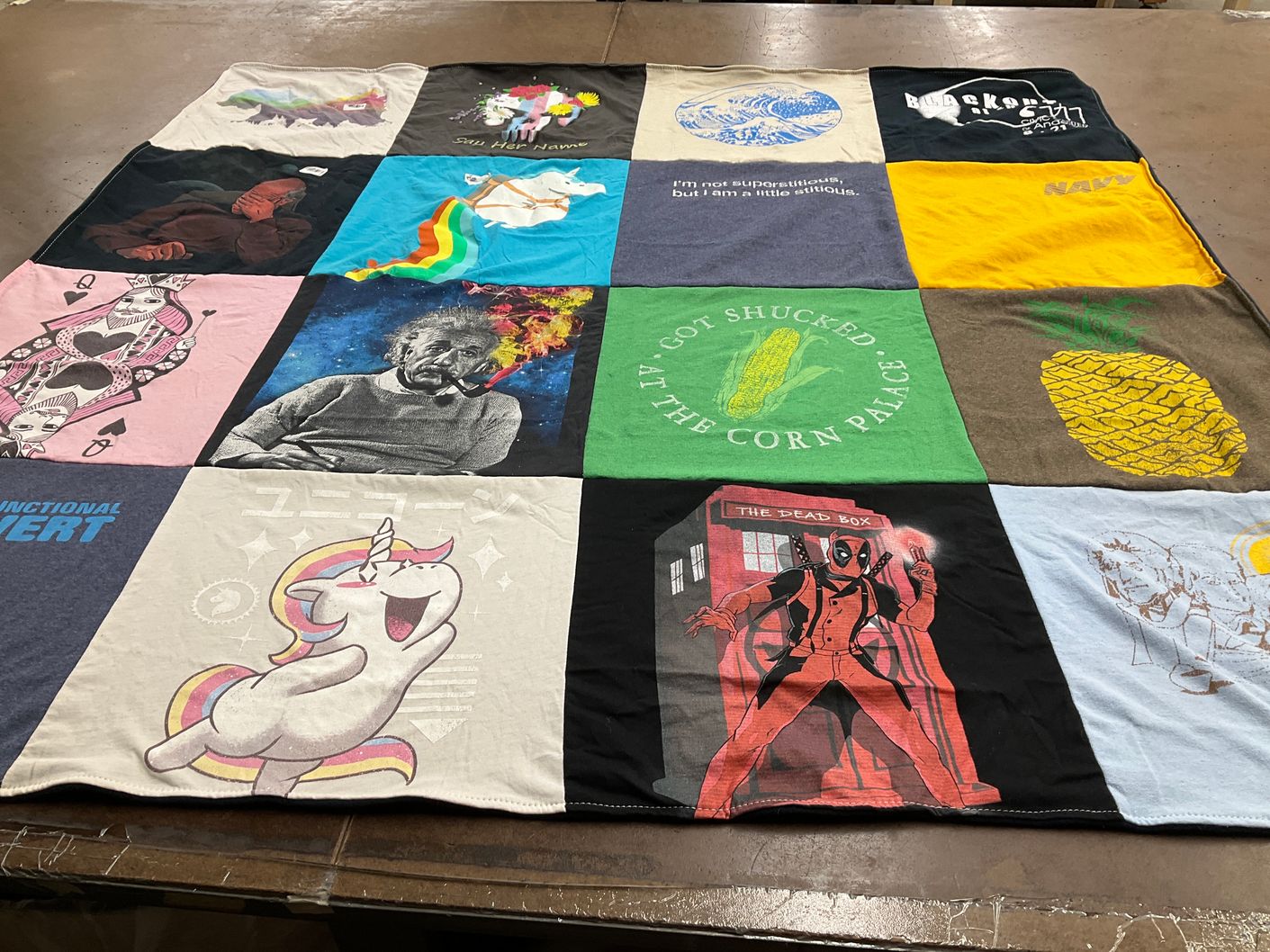 T-shirt quilt with comics, science themes by Jeremy from MD