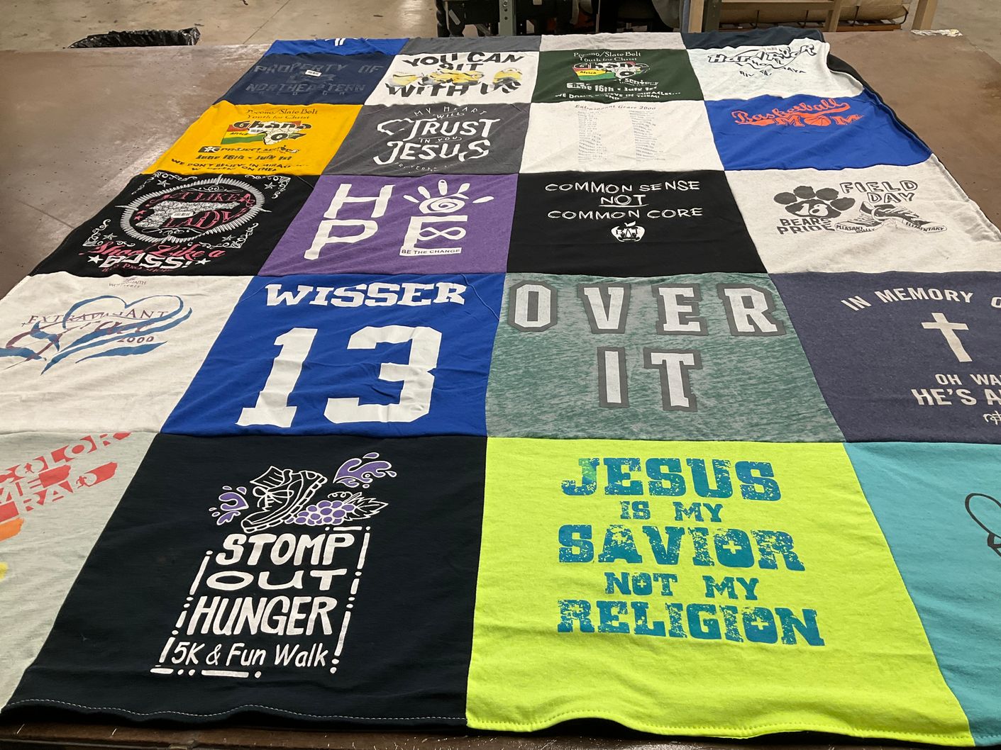 T-shirt quilt with charity, religion themes by Jessica from PA
