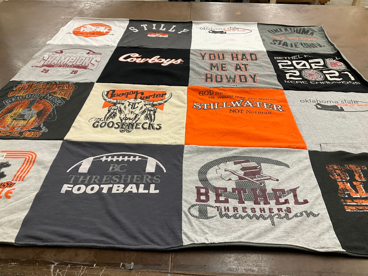 T-shirt quilt featuring bethel college threshers, oklahoma state university cowboys by Lori from OK