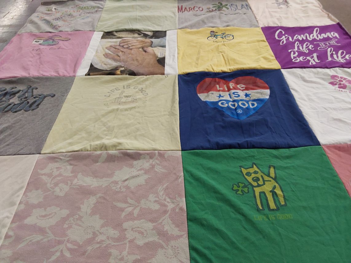 T-shirt quilt with life, family themes by Lori from WI