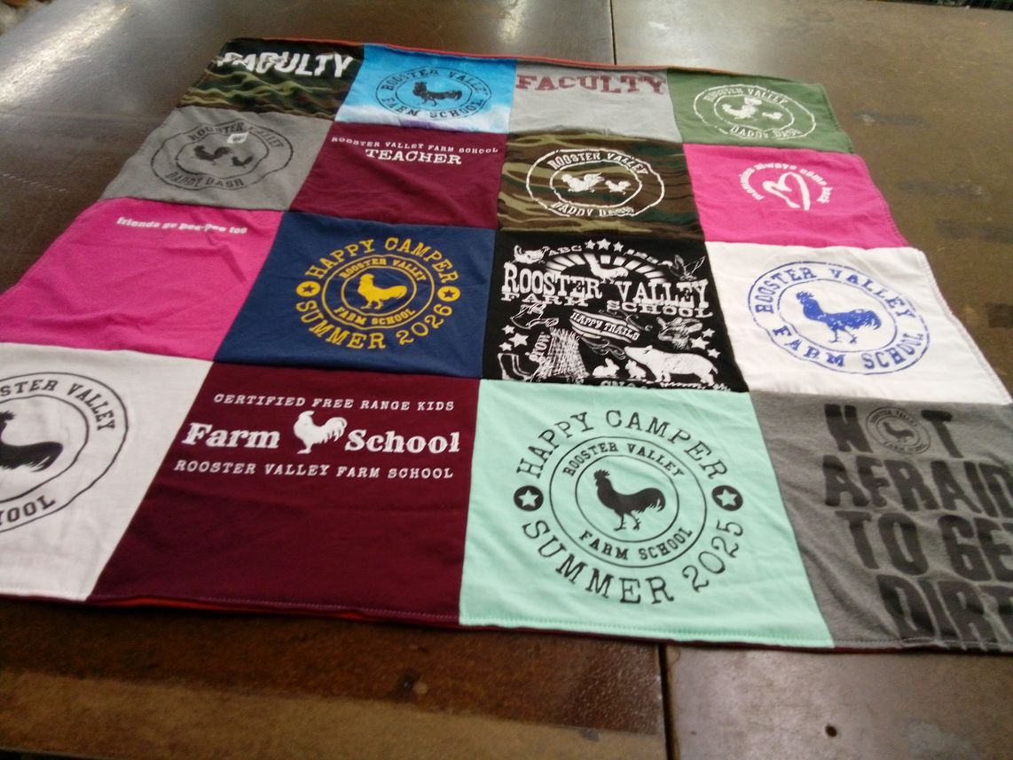 T-shirt quilt from rooster valley farm school by Jennifer from WA
