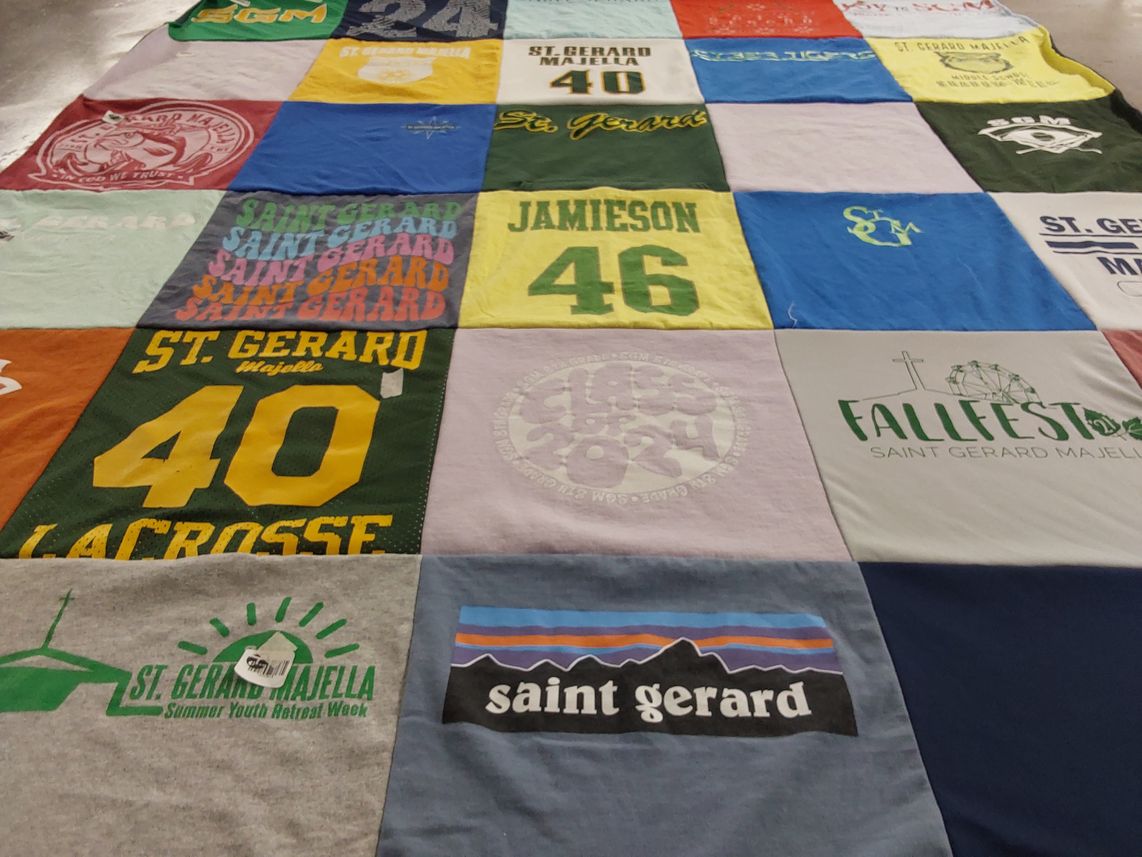 T-shirt quilt with youth programs, retreats themes by Elisha from MO