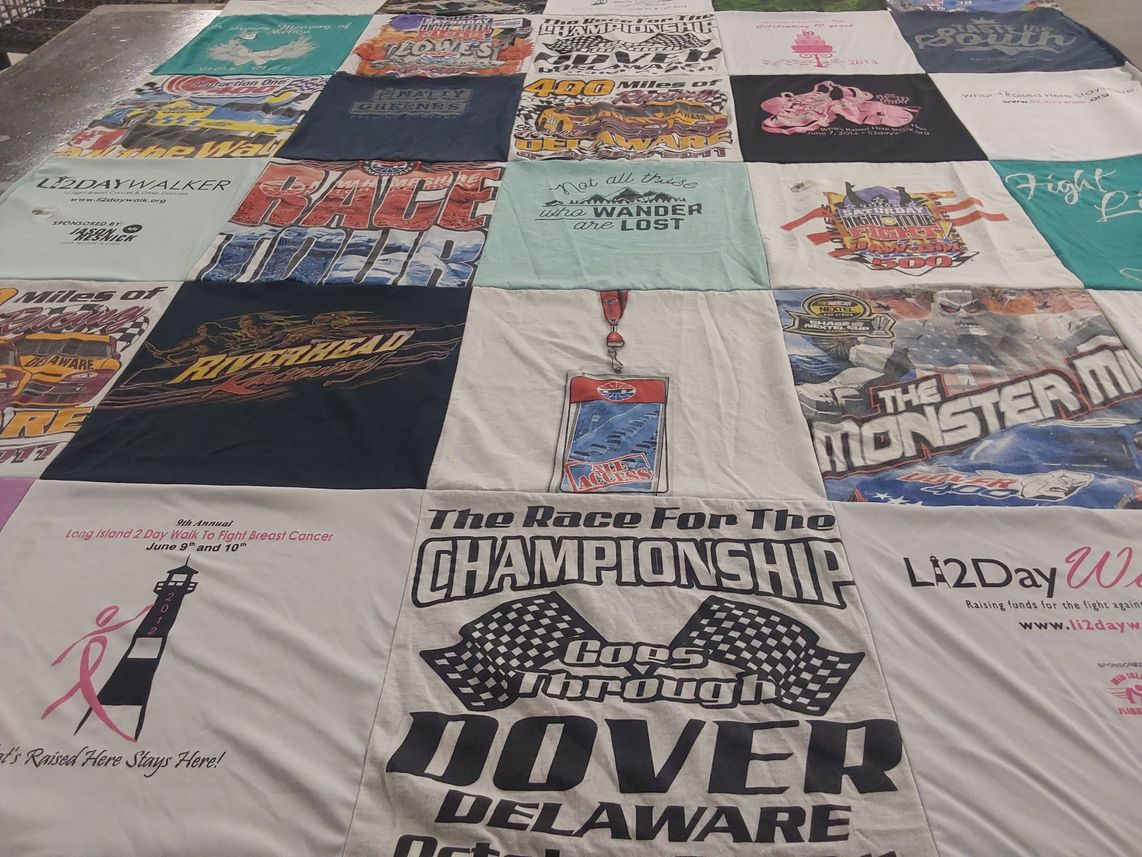 T-shirt quilt with breast cancer awareness, charity events themes by Barbara from NY
