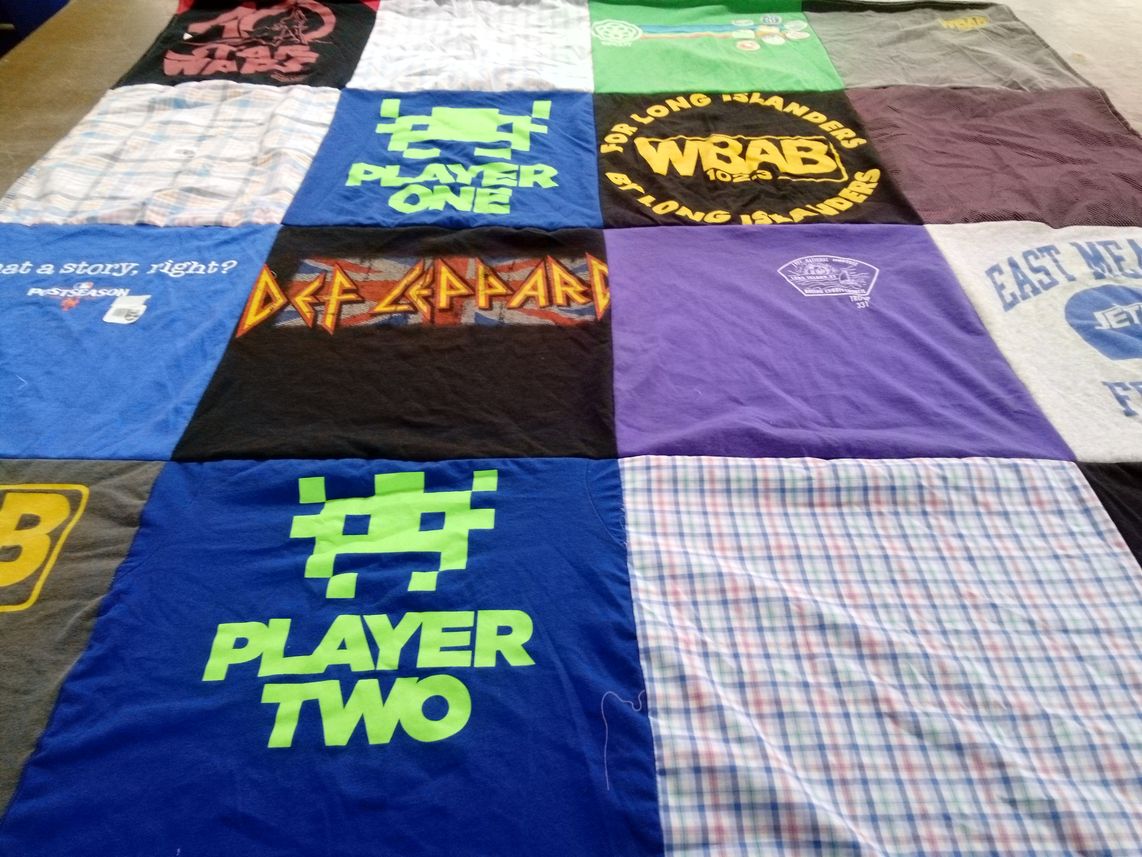 T-shirt quilt with music, sports themes by Michelle from NY