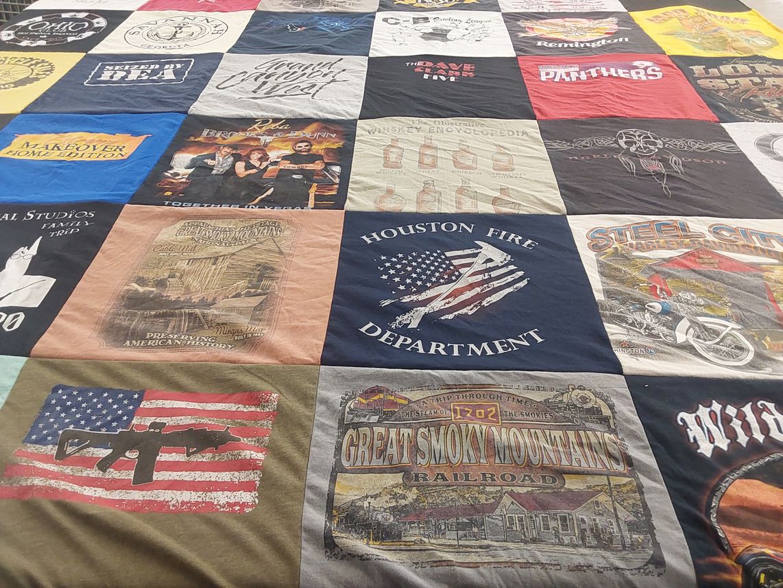 T-shirt quilt with firefighting, history themes by Mary from TX