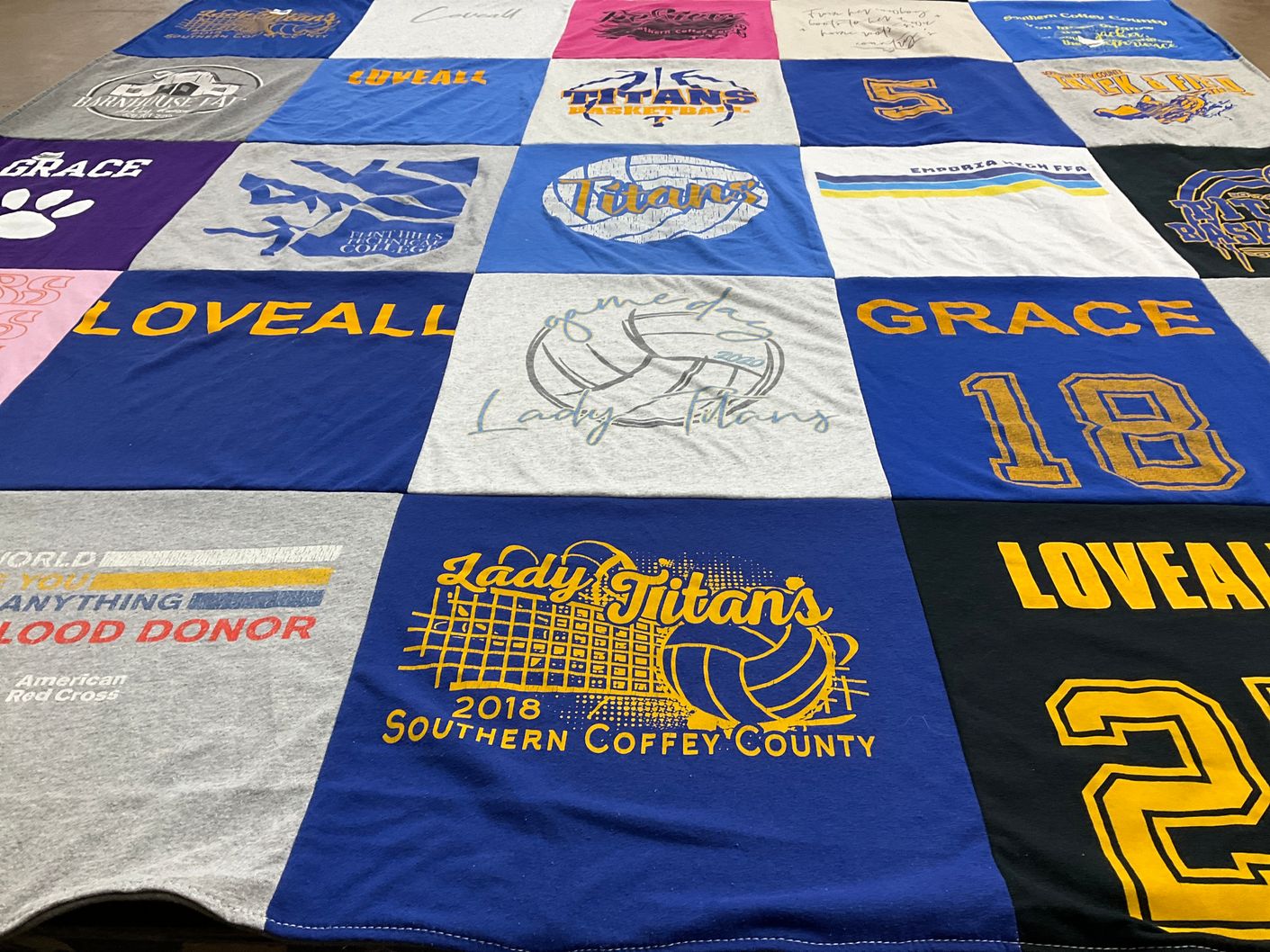 T-shirt quilt featuring lady titans volleyball team by Laura from KS