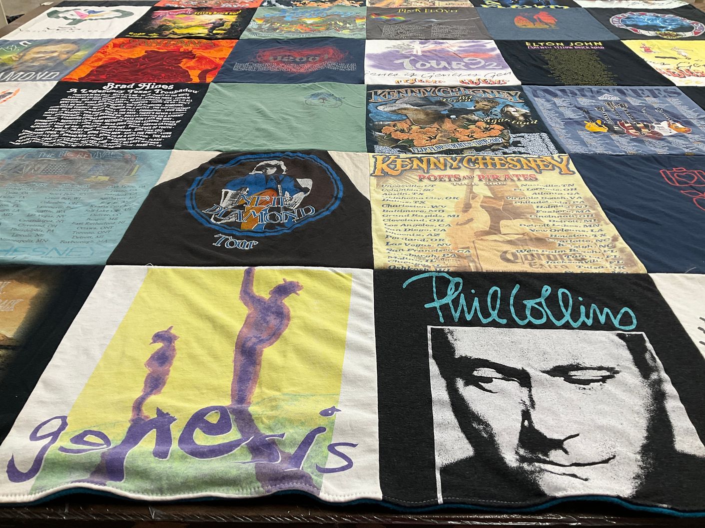 T-shirt quilt with music, concerts themes by Debbi from TX