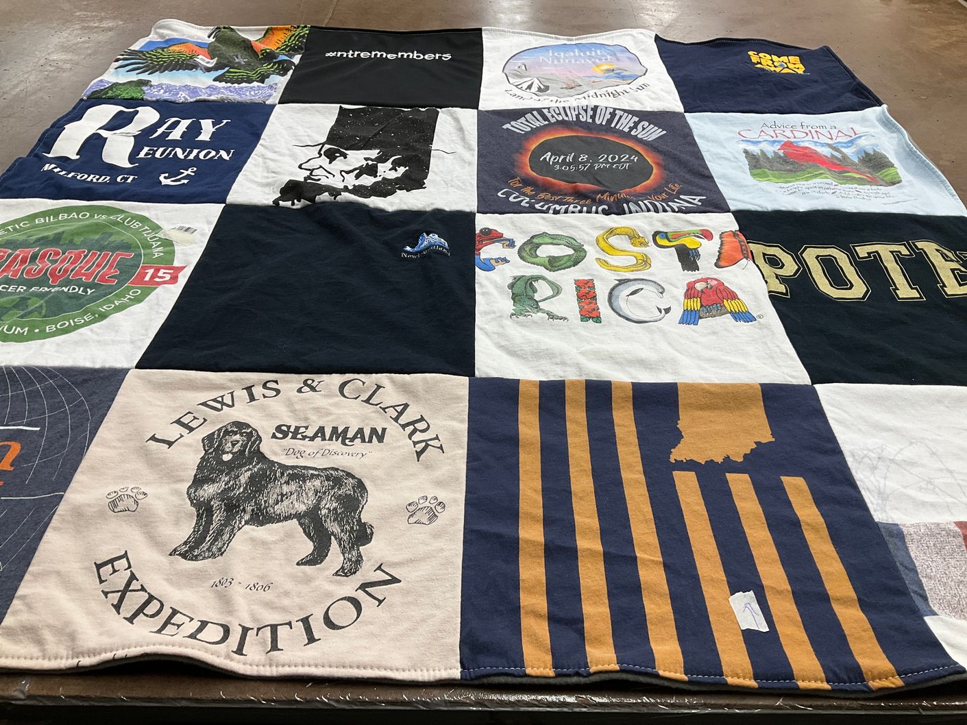 T-shirt quilt with travel, outdoors themes by Nina from ID