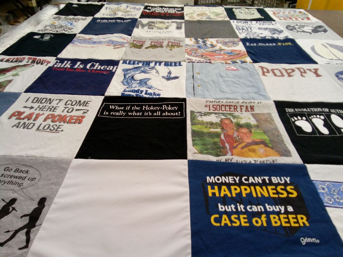T-shirt quilt with fishing, soccer themes by Devon from CA