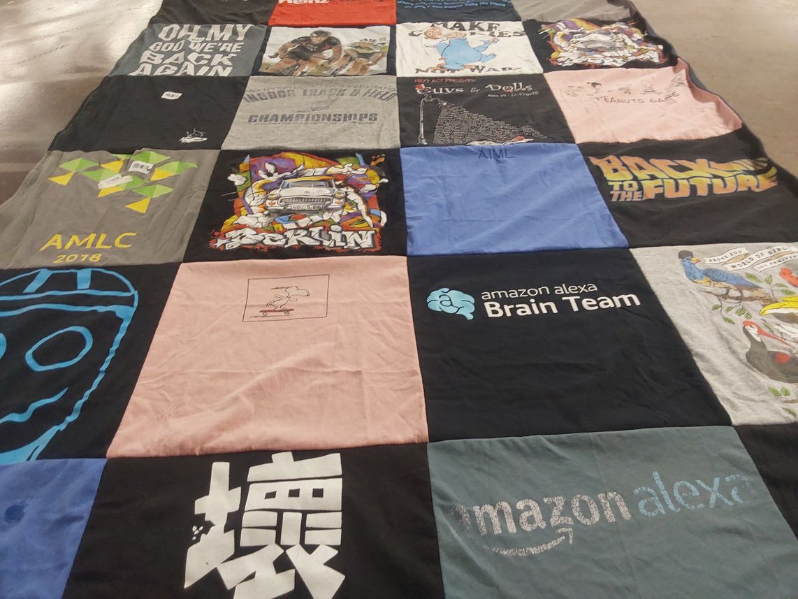 T-shirt quilt with movies, technology themes by Diana from NY