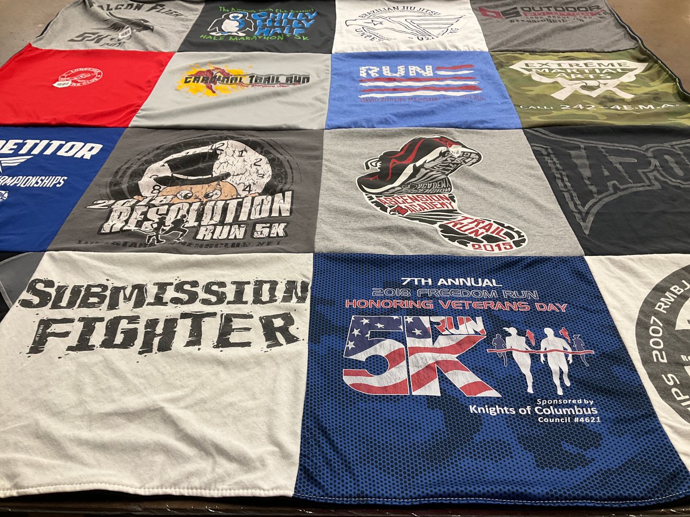 T-shirt quilt with running, martial arts themes by Jacque from TX