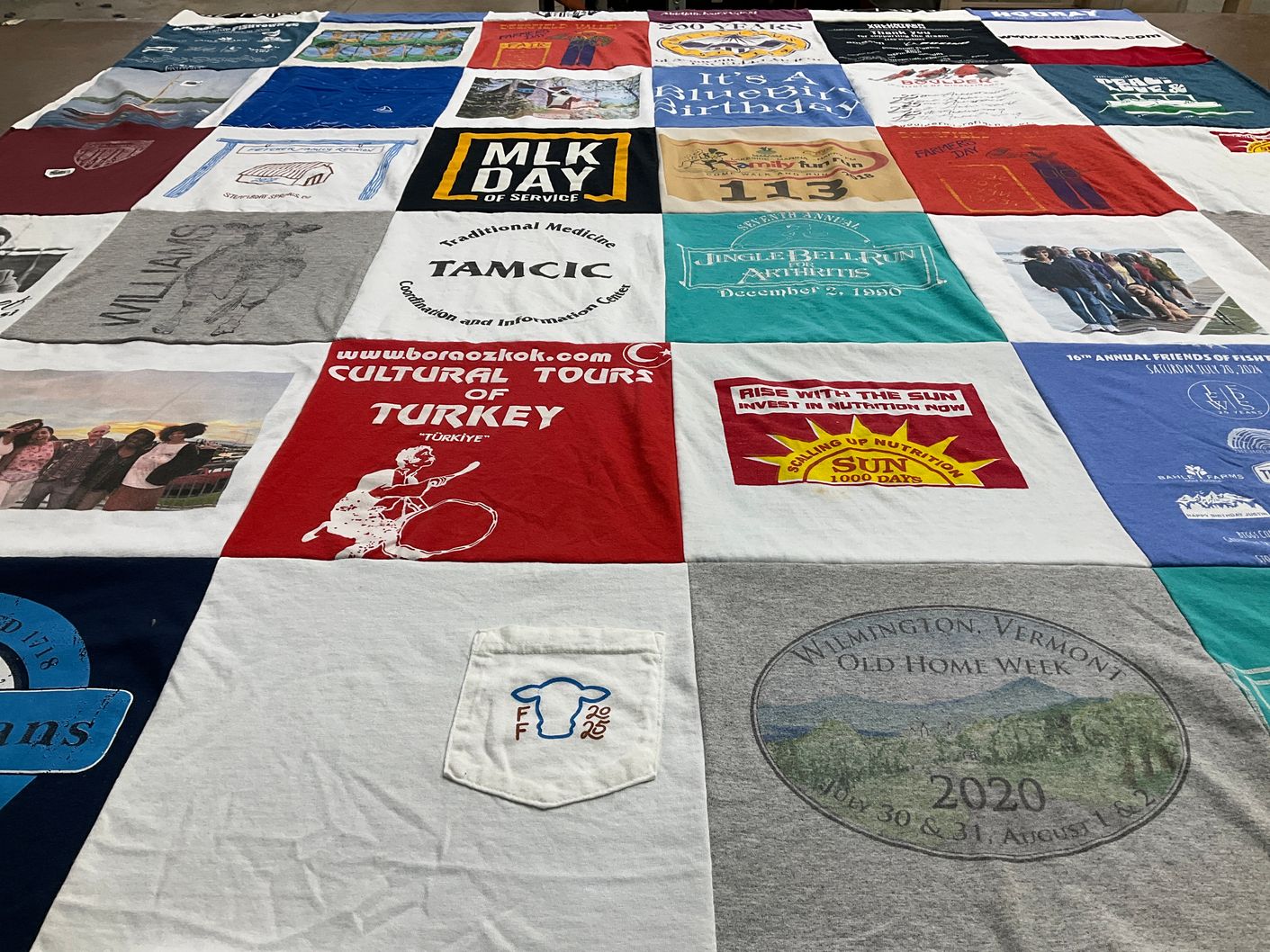 T-shirt quilt with community service, cultural exchange themes by William from MI