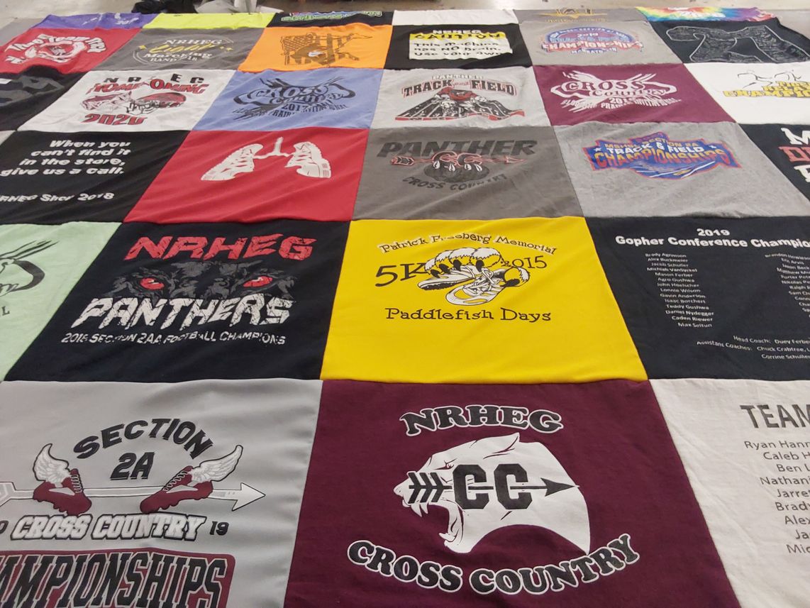 T-shirt quilt featuring nrheg cross country by Larry from MN